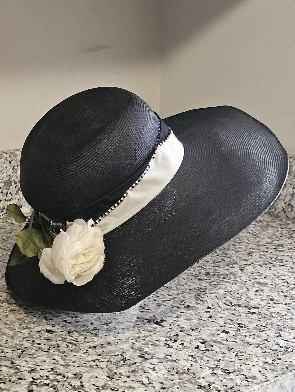 Vintage Leslie James Black Straw Wide Brim Derby Sun Hat with White Rose Accent
